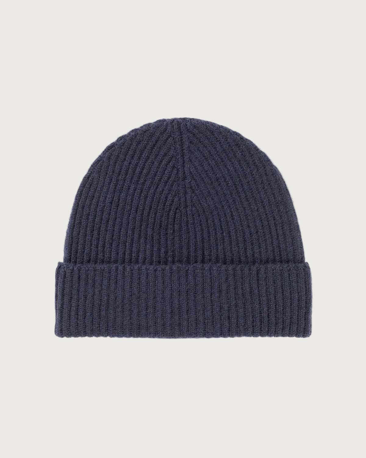 Johnstons of Elgin’s Navy Cashmere Ribbed Hat on white background HAA03320SD0707