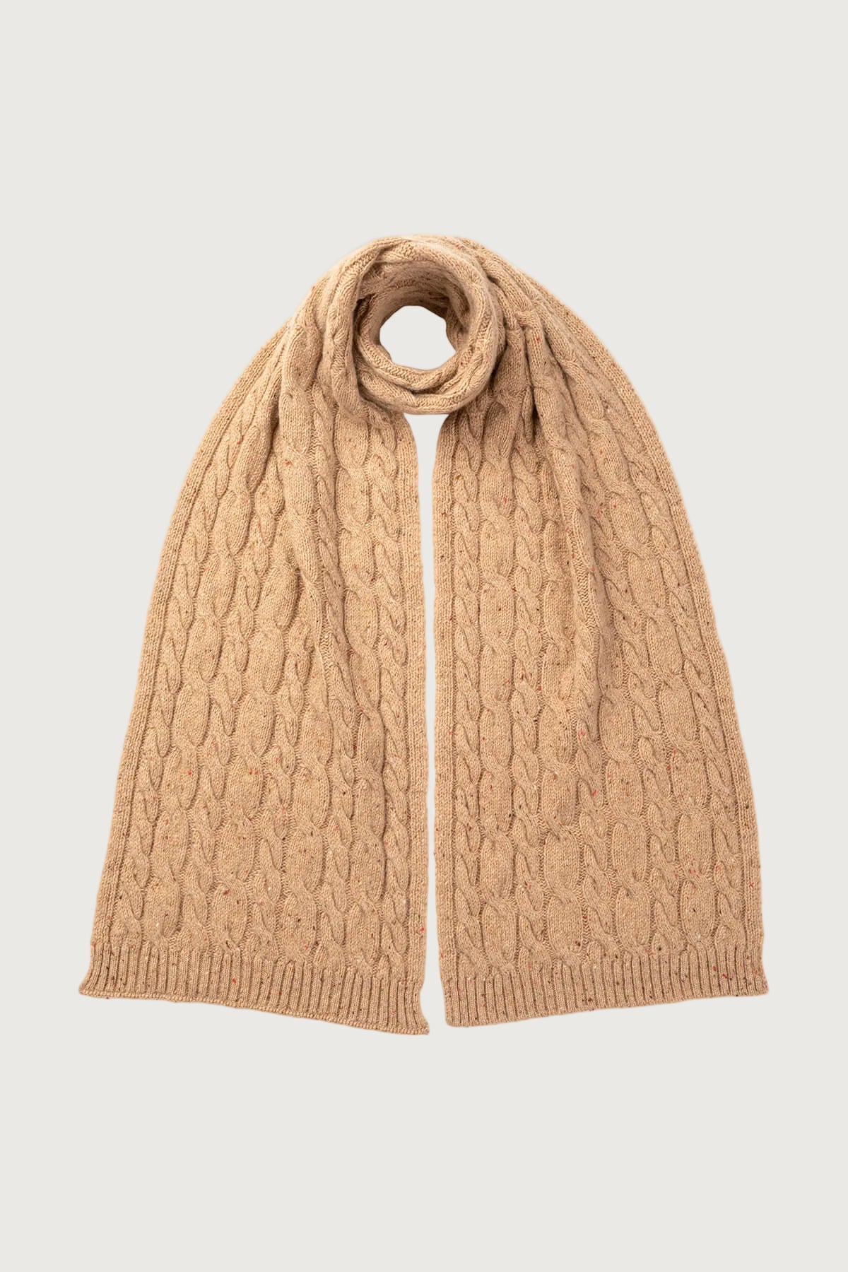 Johnstons of Elgin’s Camel Donegal Cashmere Donegal Cable Scarf on a white background HAC03311004507