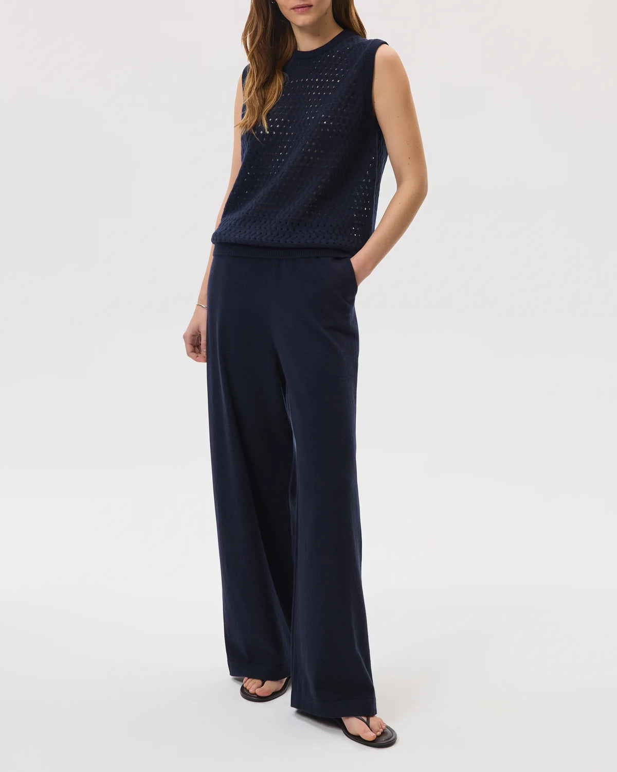 Johnstons of Elgin SS25 Women's Knitwear Navy High Rise Cashmere Culottes worn with navy cashmere mesh tank top KBP00926SD7286