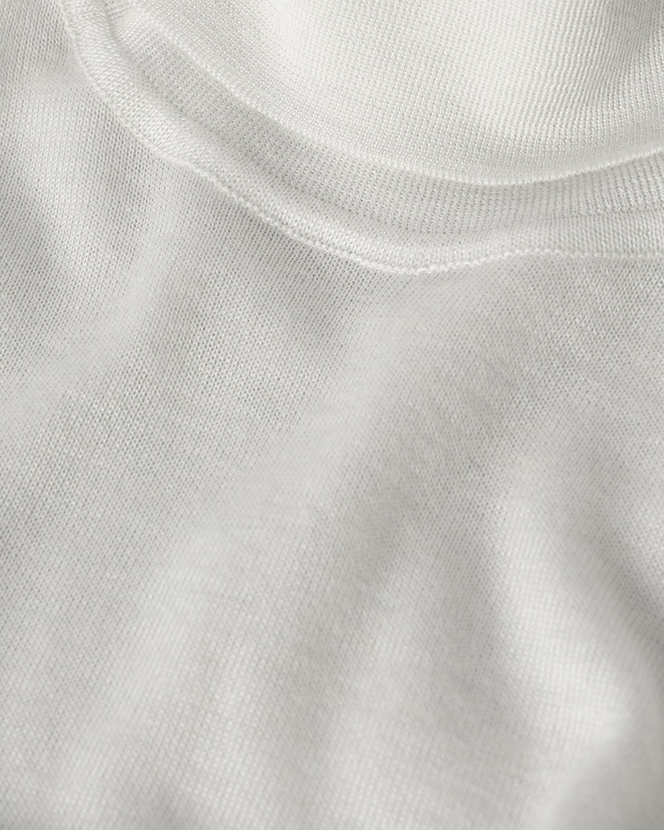 Johnstons of Elgin AW25 Women's Knitwear Zinc White Superfine Cashmere White Roll Neck Jumper Close Up KAI05607HA0327