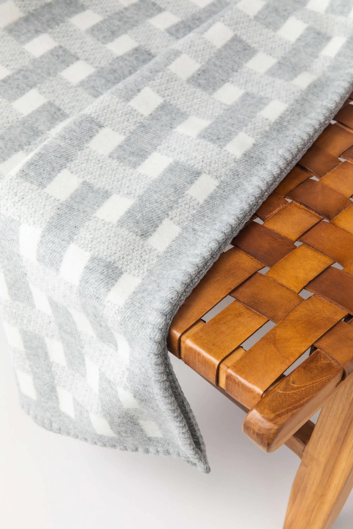 2025 Johnstons of Elgin Interiors Collection Light Grey & White Blanket Stitched Basketweave Throw detail shot TB000500RU7442ONE