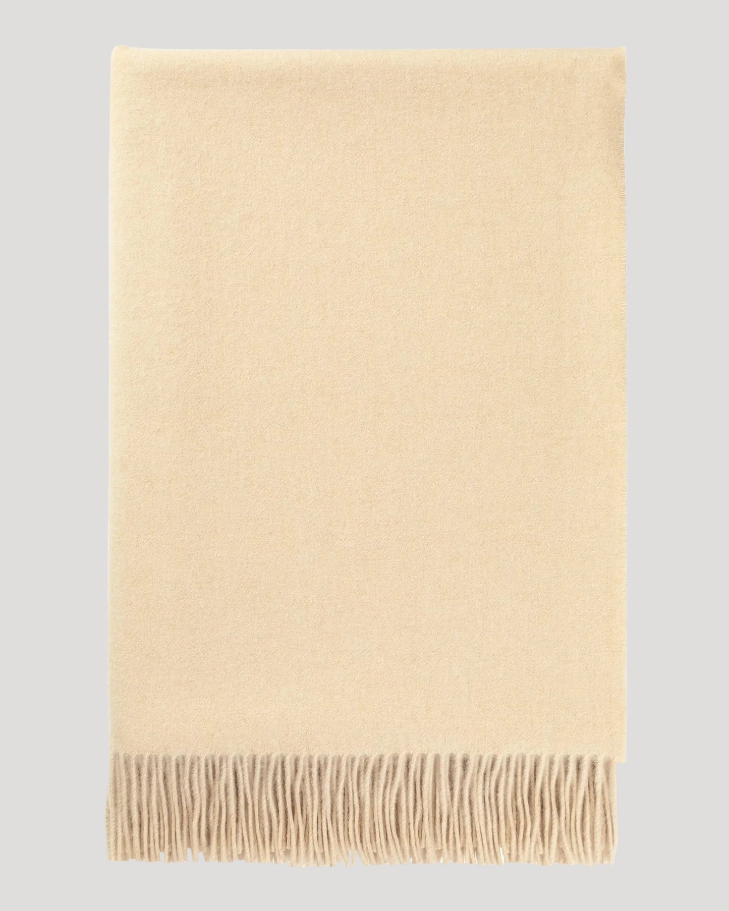 Johnstons of Elgin Interiors Collection Blonde Blonde Cashmere Throw on a white background WA000055HB0167ONE