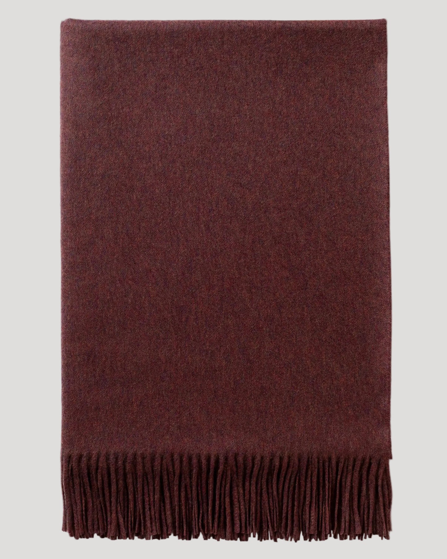2025 Johnstons of Elgin Interiors Collection Damson Cashmere Throw on a white background WA000055HE7062ONE