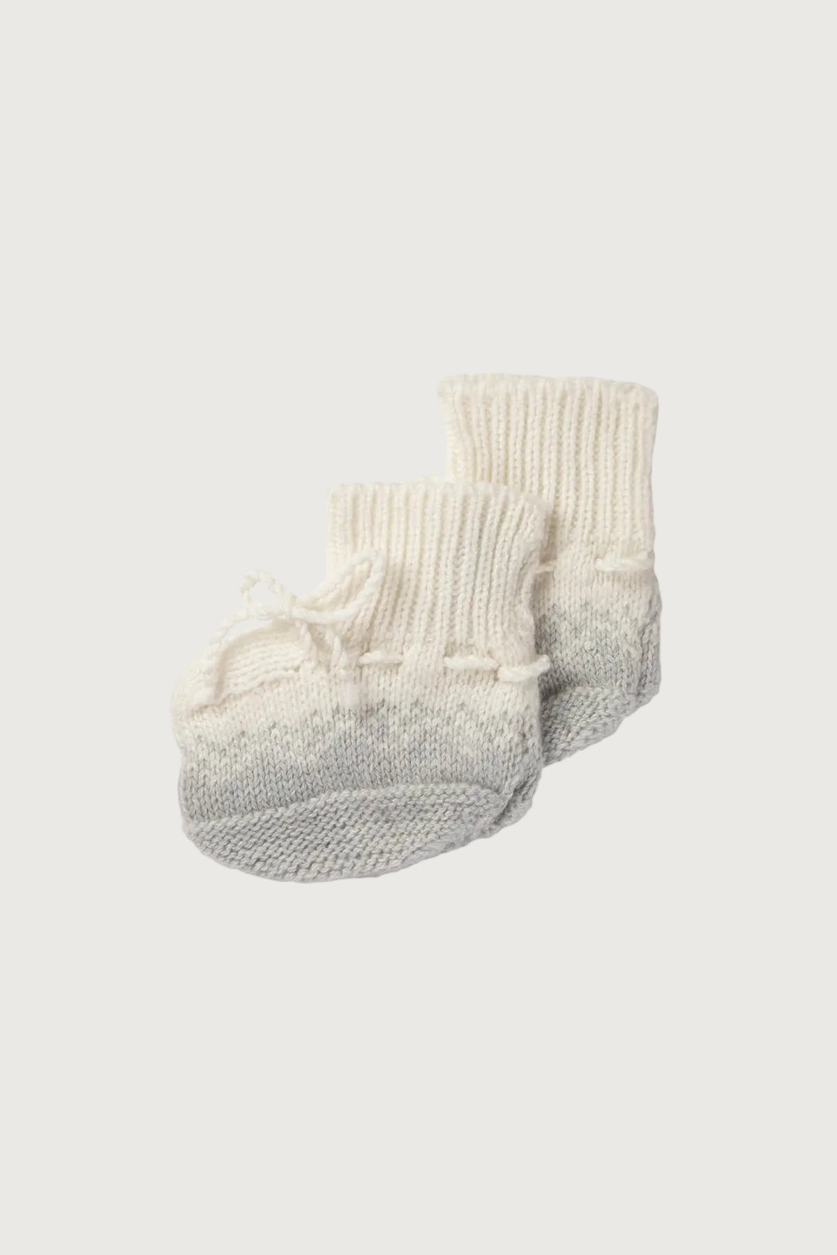 Johnstons of Elgin Hand Knitted Ombre Cashmere Baby Booties in Pumice on a white background JA000128HA0090