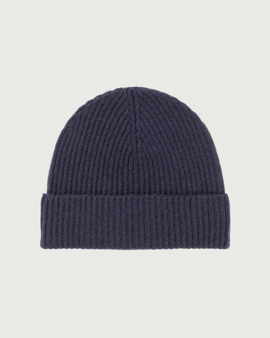 Johnstons of Elgin’s Navy Cashmere Ribbed Hat on white background HAA03320SD0707