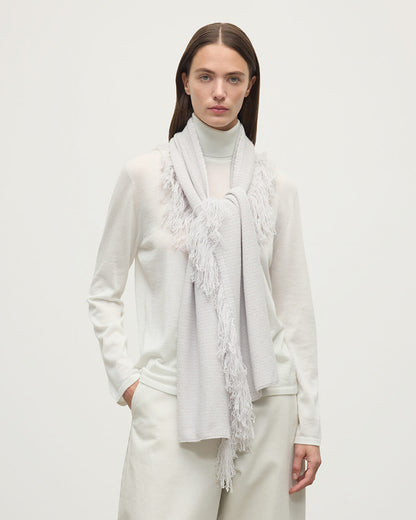 Model wears Johnstons of Elgin white and grey fringed cashmere scarf HAA03529Q25345ONE