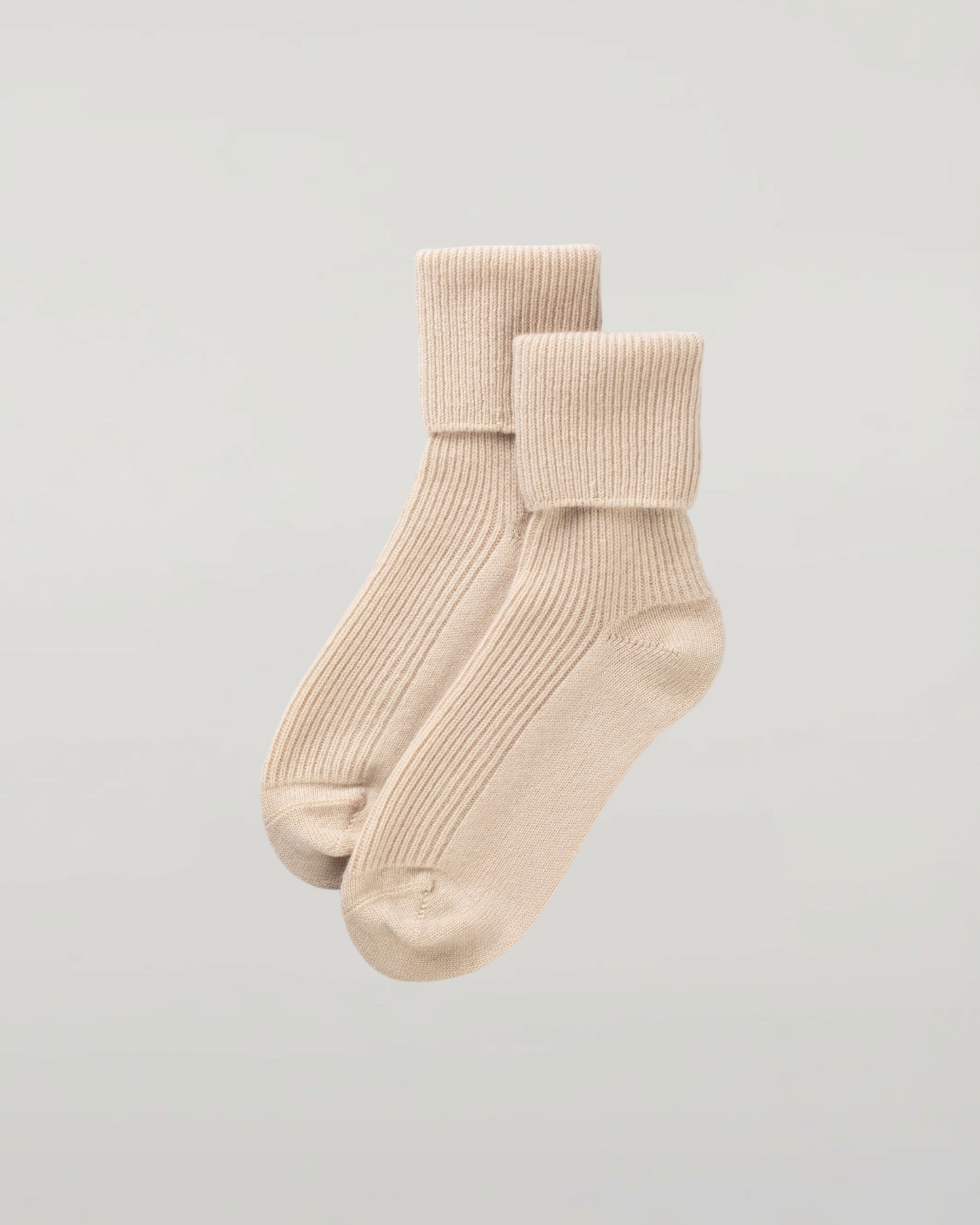 Johnstons of Elgin set of three pairs of cashmere socks in pastel colours on a light grey background 2025GIFTSET3A