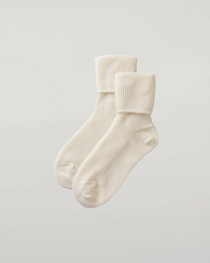 Johnstons of Elgin set of three pairs of cashmere socks in pastel colours on a light grey background 2025GIFTSET3A