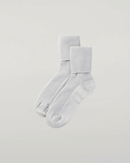 Johnstons of Elgin set of three pairs of cashmere socks in light blue, white, and navy on a white background 2025GIFTSET3B