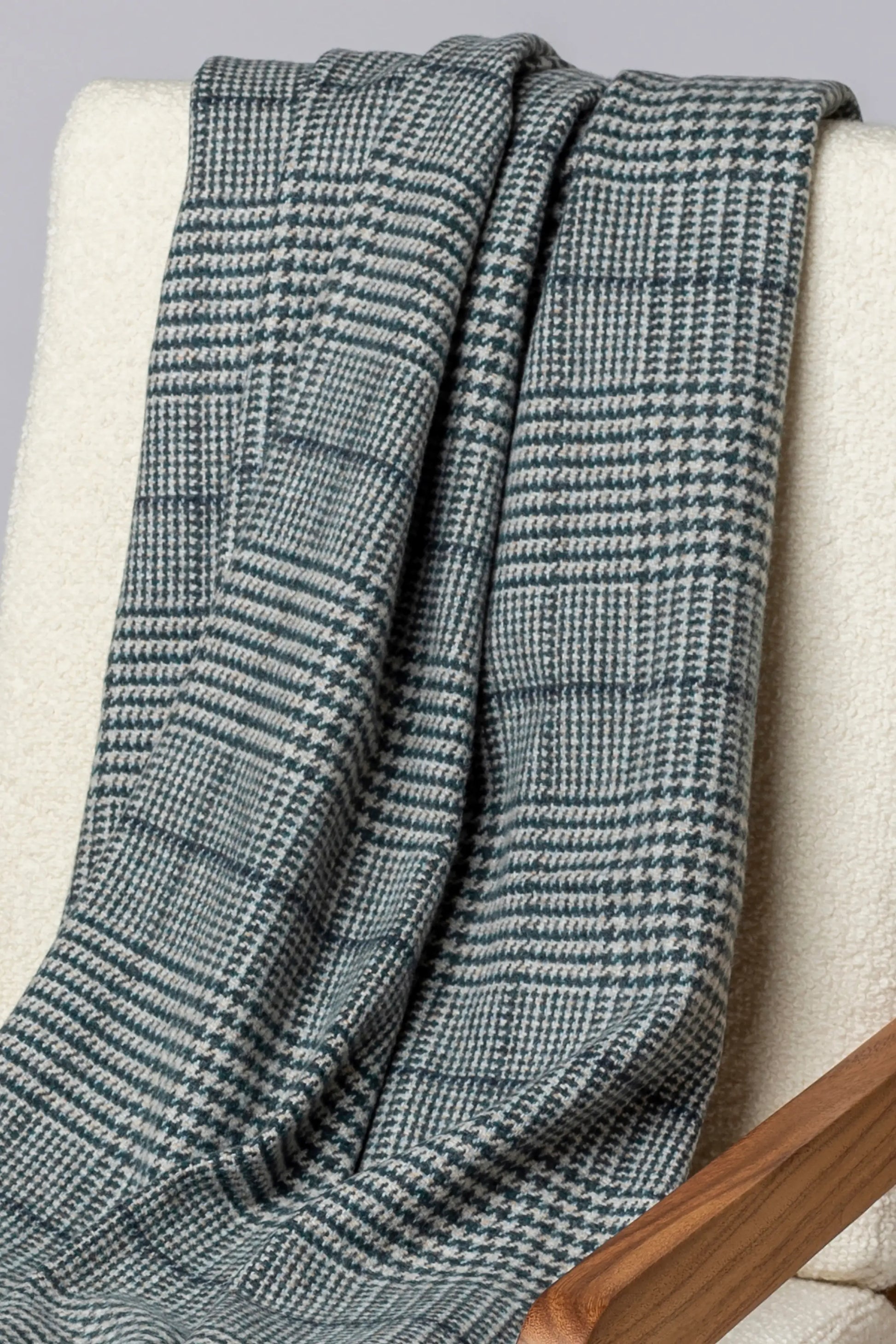 2025 Johnstons of Elgin Interiors Collection Bottle Tweed Glen Check Wool Throw on a grey background  WDC01930RU7652ONE