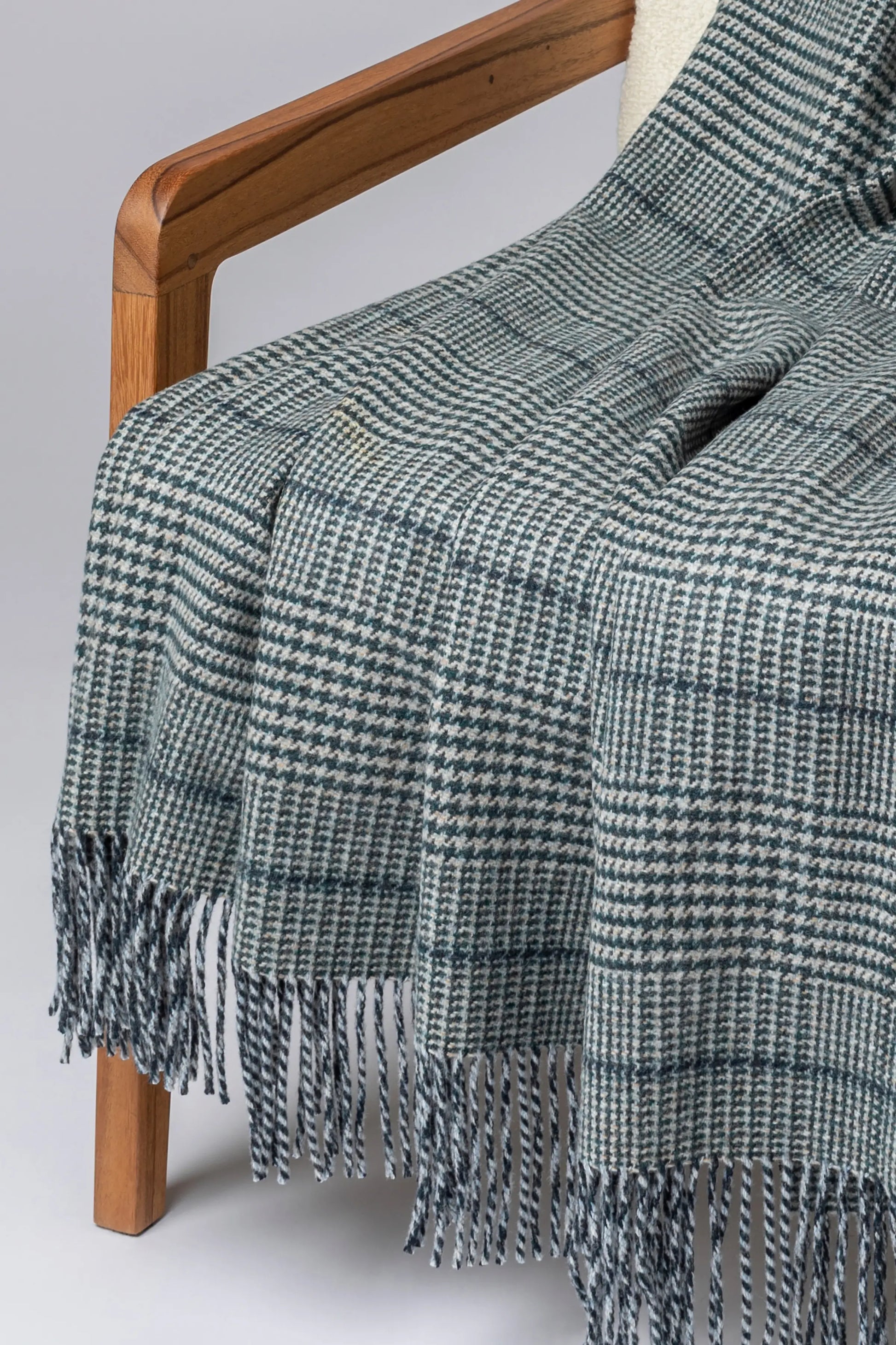 2025 Johnstons of Elgin Interiors Collection Bottle Tweed Glen Check Wool Throw on a grey background  WDC01930RU7652ONE