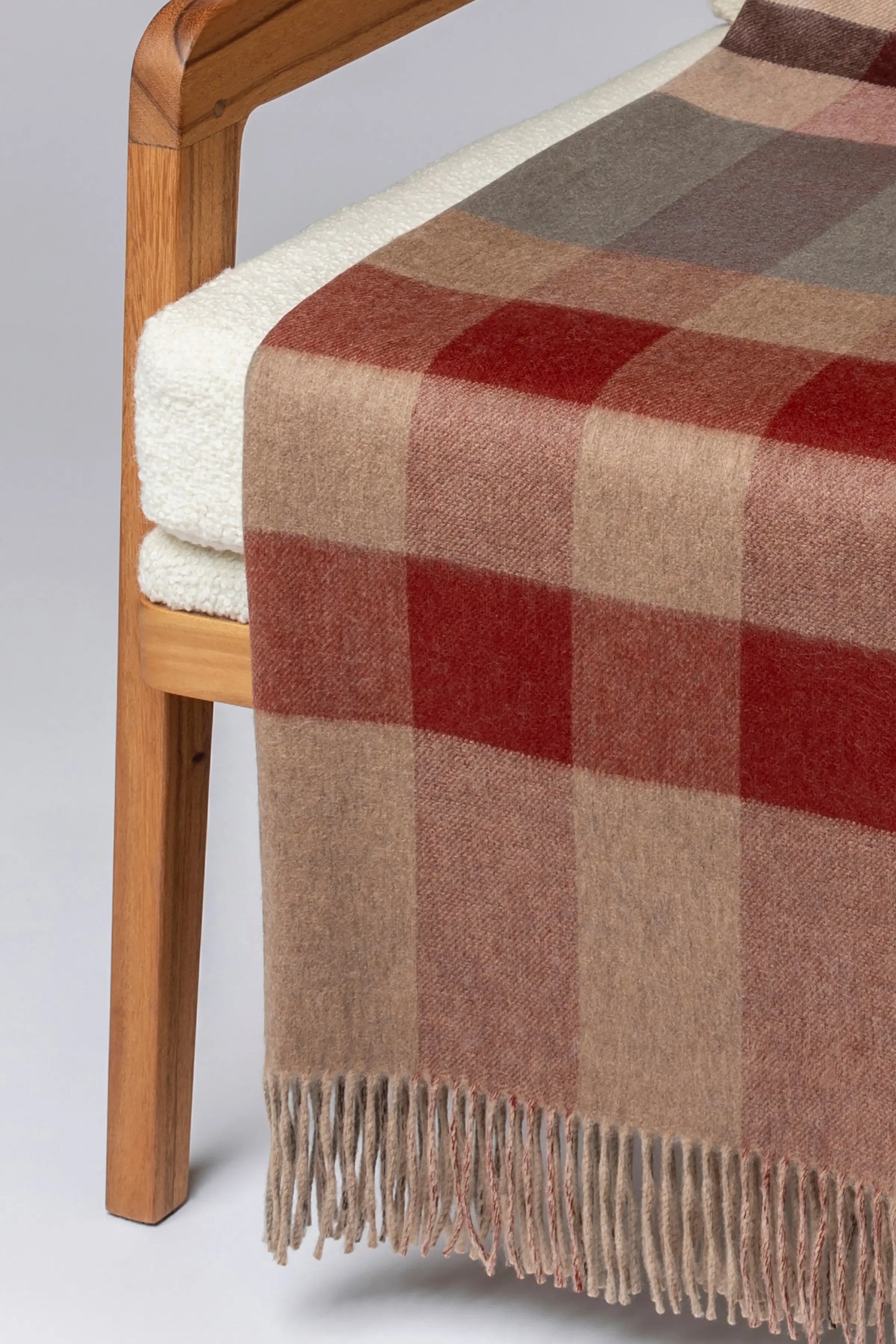 2025 Johnstons of Elgin Interiors Collection Rowan Check Reversible Cashmere Throw on a grey background  WA000013RU7605ONE