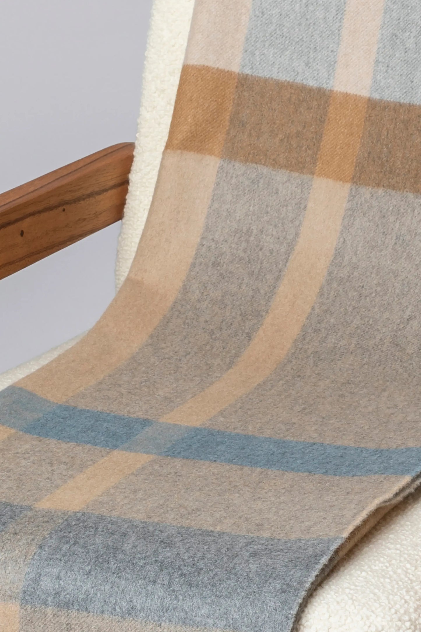 2025 Johnstons of Elgin Interiors Collection Birch Check Reversible Cashmere Throw on a grey background  WA000013RU7603ONE