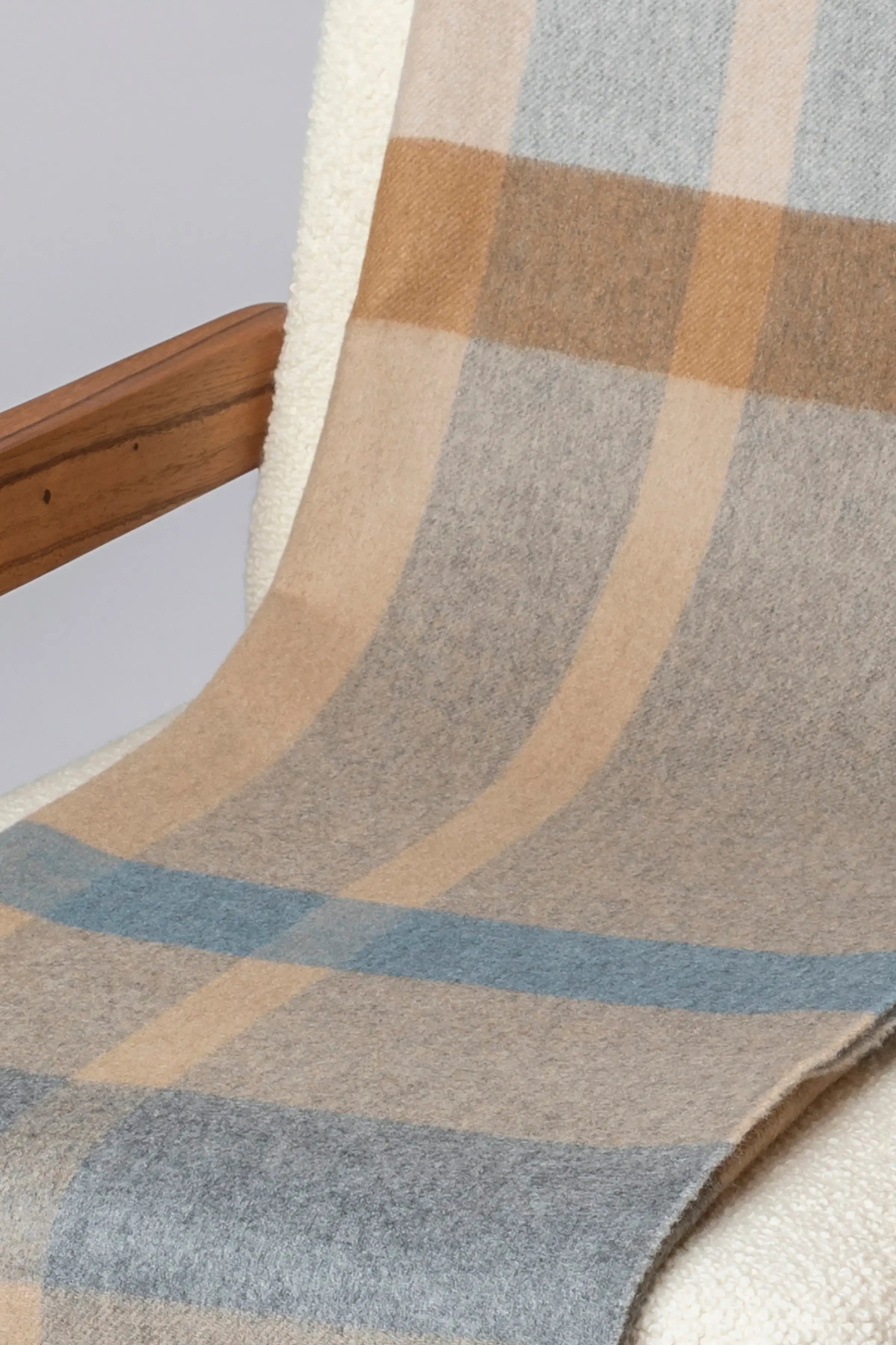 2025 Johnstons of Elgin Interiors Collection Birch Check Reversible Cashmere Throw on a grey background  WA000013RU7603ONE