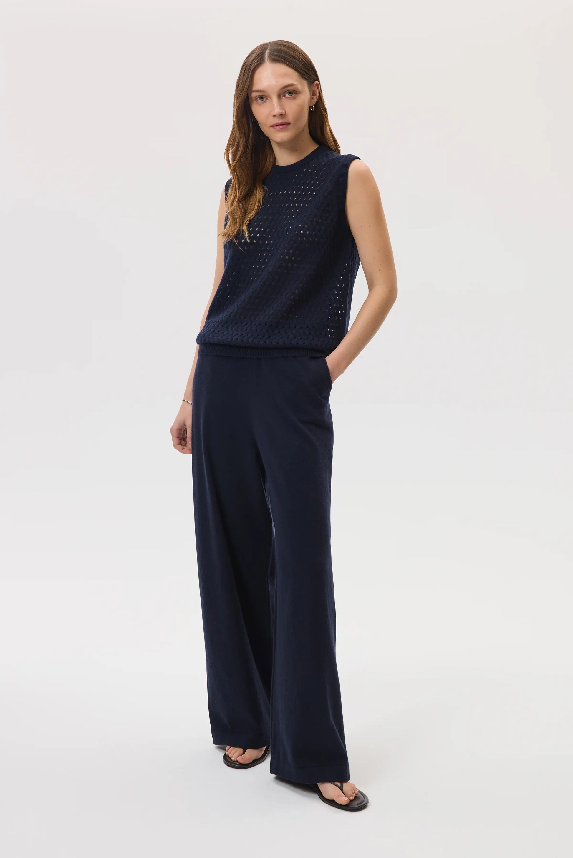 Johnstons of Elgin SS25 Women's Knitwear Navy High Rise Cashmere Culottes worn with navy cashmere mesh tank top  KBP00926SD7286