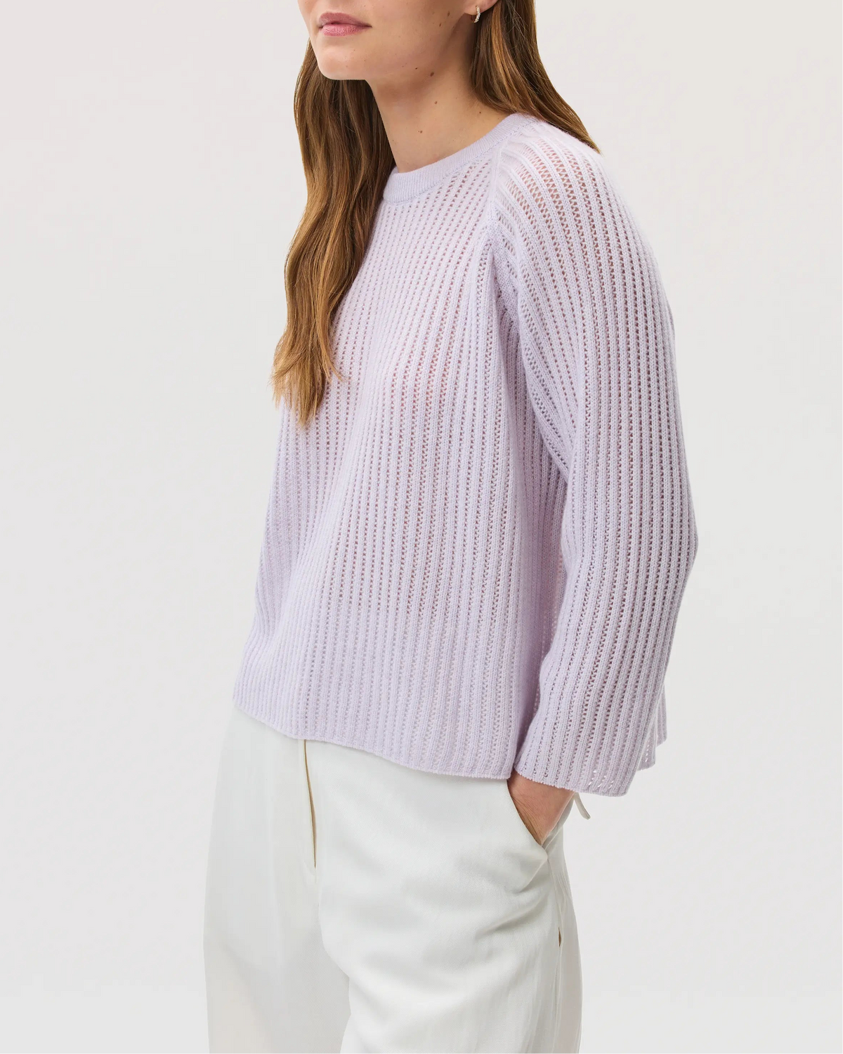 Model wearing Johnstons of Elgin SS25 Women's Knitwear Lavender Mesh Rib Cashmere Jumper against a white backdrop KAA05430HD0086