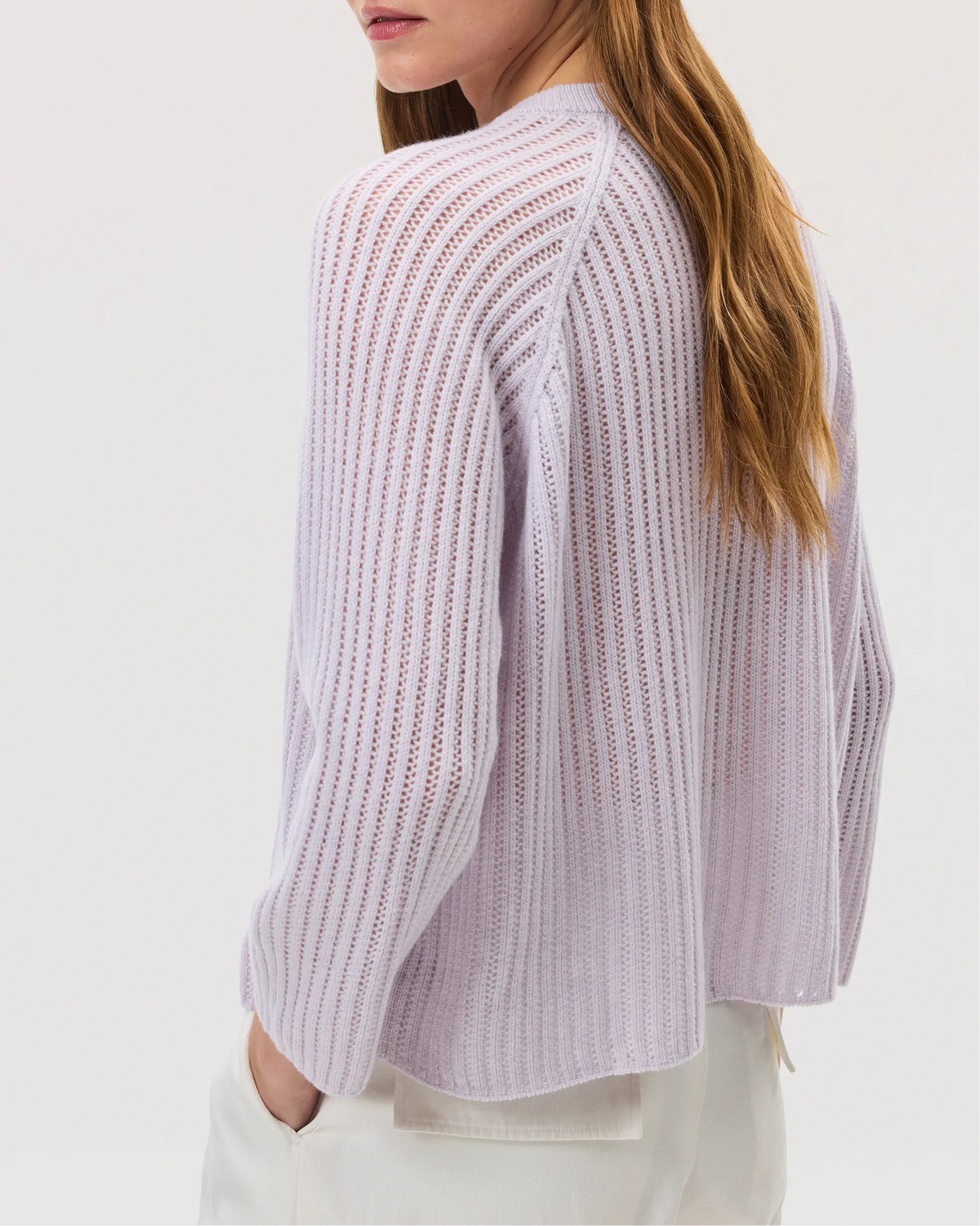 Model wearing Johnstons of Elgin SS25 Women's Knitwear Lavender Mesh Rib Cashmere Jumper with white jeans KAA05430HD0086