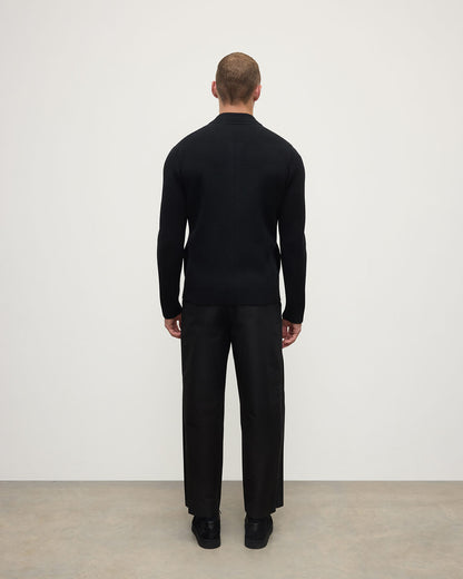 Back view of a model wearing Johnstons of Elgin Men's Knitwear Black Milano Ribbed Zip Black Cashmere  KAA05443SA7210
