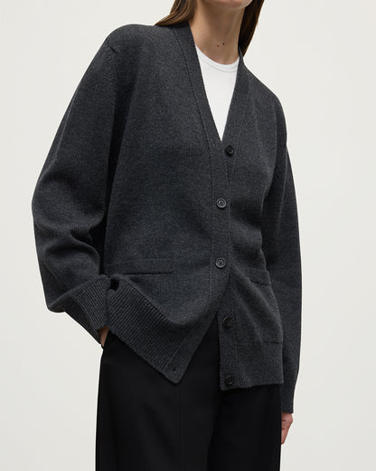 Model wearing Johnstons of Elgin AW25 Women's Knitwear Charcoal Boyfriend-Fit Grey Cashmere Cardigan close up KAA05560HA7165