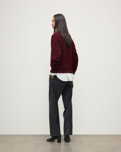BACK OF WOMENS KYLESKU DEEP VEE SWEATER RED ON A MODEL KAA05728HE7068