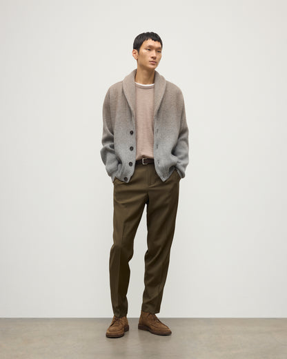 MALE MODEL WEARING JOHNSTONS OF ELGIN PIONEER SHAWL CARDIGAN GREY 100% CASHMERE WITH OLIVE GREEN CHINOS, WHITE T-SHIRT KAA05750Q25948