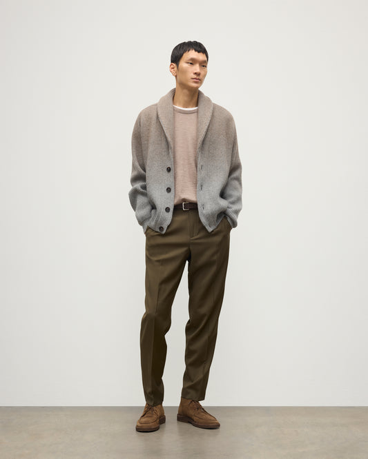 MALE MODEL WEARING JOHNSTONS OF ELGIN PIONEER SHAWL CARDIGAN GREY 100% CASHMERE WITH OLIVE GREEN CHINOS, WHITE T-SHIRT KAA05750Q25948