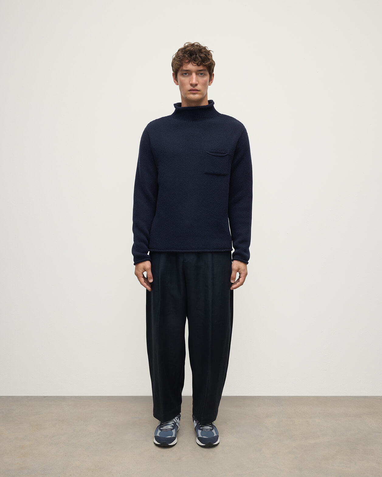 Front view of a model wearing Johnstons of Elgin Men's Knitwear Dark Navy Navy Cashmere Turtleneck Jumper KAB05484SD7666