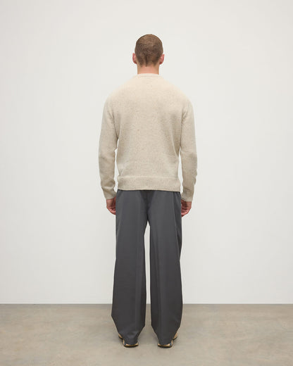 Model wears Johnstons of Elgin AW25 Men's Knitwear Cream Dun Donegal Cream Donegal Cashmere Marl Jumper back KAC05287006334