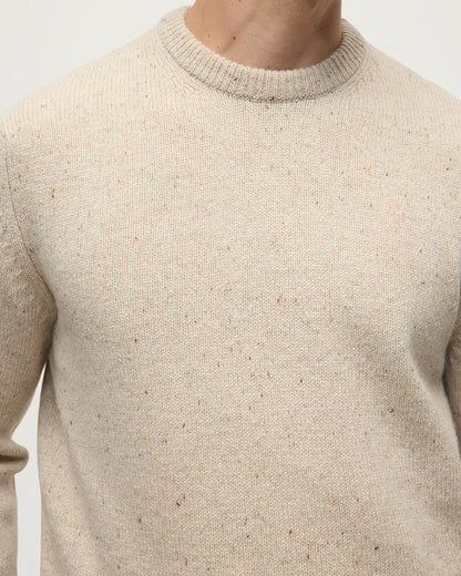Model wears Johnstons of Elgin AW25 Men's Knitwear Cream Dun Donegal Cream Donegal Cashmere Marl Jumper Close up KAC05287006334