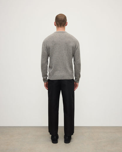 Model wearing Johnstons of Elgin AW25 Men's Knitwear Peregrine Donegal Grey Donegal Cashmere Marl Jumper Back KAC05287006335