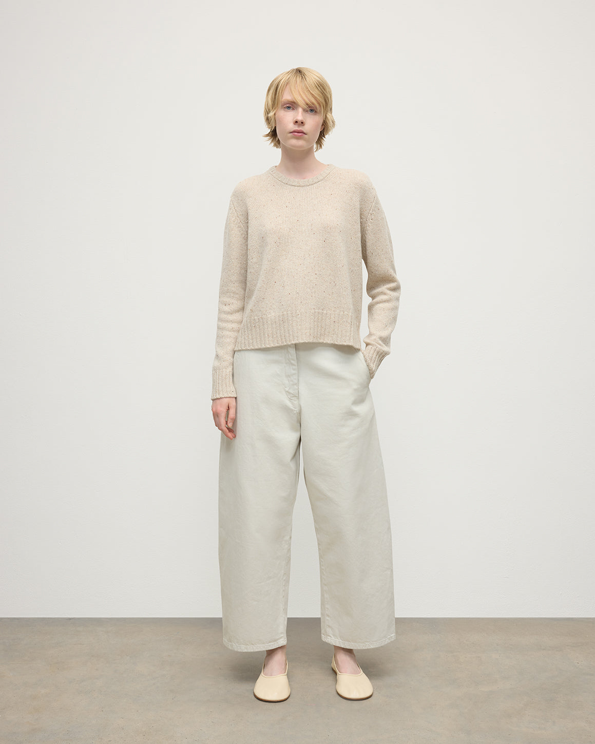 Model wearing Johnstons of Elgin AW25 Women's Knitwear Cream Dun Donegal Donegal Cashmere Cream Jumper Front View KAC05289006334
