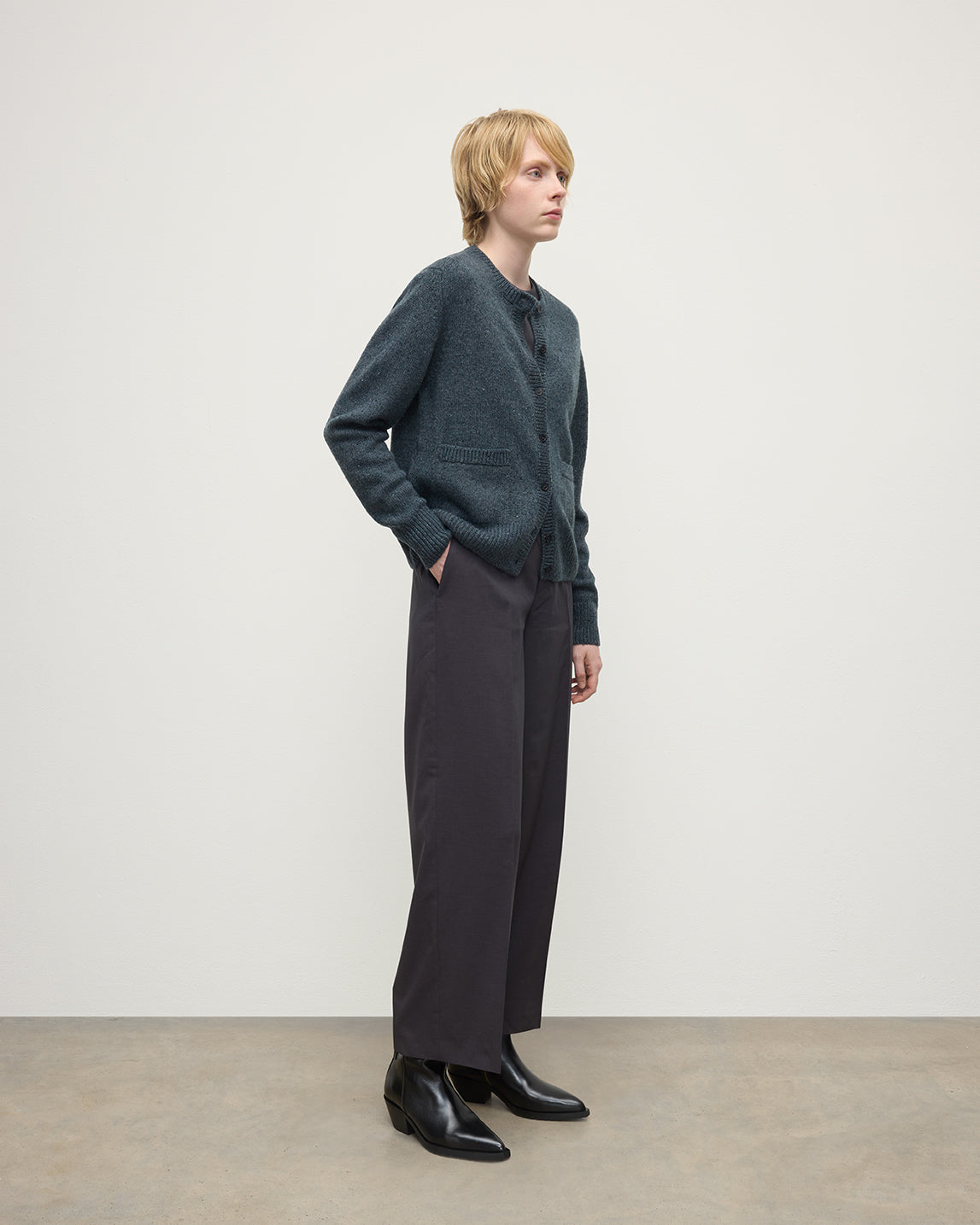 Model wearing Johnstons of Elgin AW25 Women's Knitwear Storm Donegal Donegal Cashmere Blue Cardigan Side View KAC05494006336