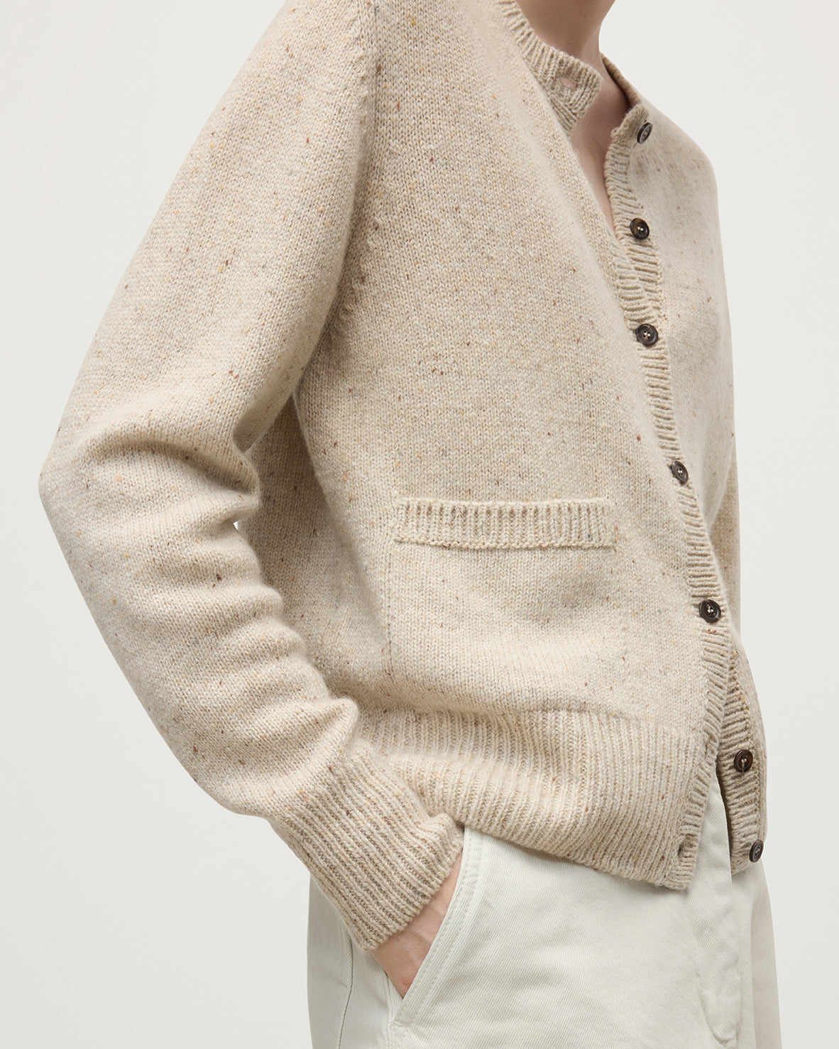 Model wearing Johnstons of Elgin AW25 Women's Knitwear Cream Dun Donegal Donegal Cashmere Cream Cardigan Close Up KAC05494006334