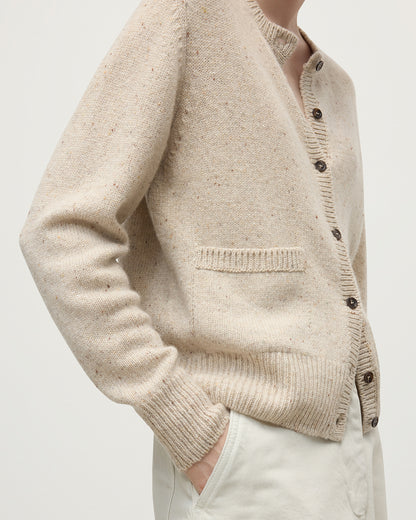 Model wearing Johnstons of Elgin AW25 Women's Knitwear Cream Dun Donegal Donegal Cashmere Cream Cardigan Close Up KAC05494006334