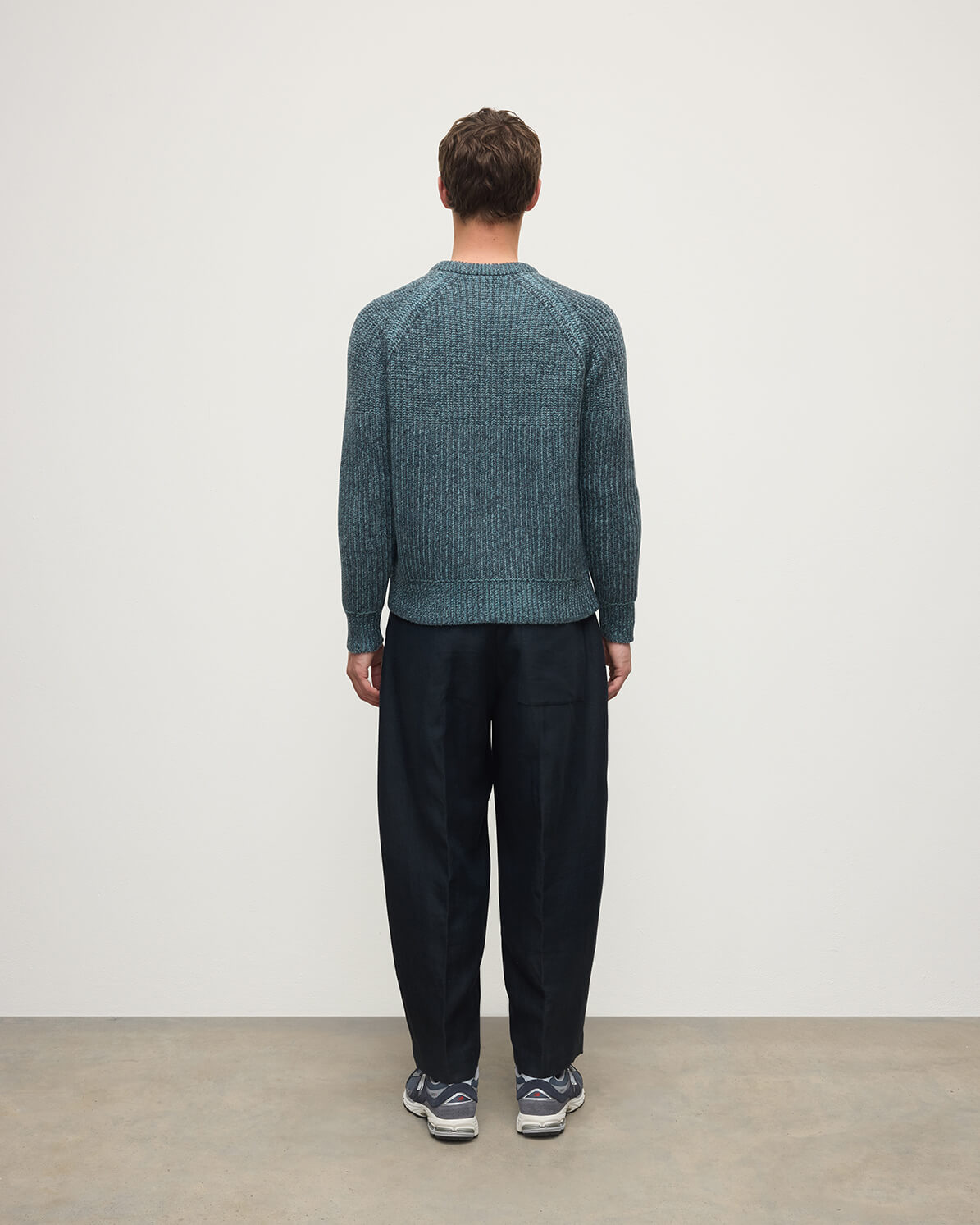 Model wears Johnstons of Elgin AW25 Men's Knitwear Storm Donegal & Seascape Ribbed Donegal Cashmere Blue Jumper Back KAC05581Q25392