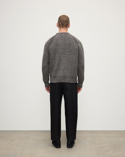 Model wearing Johnstons of Elgin AW25 Men's Knitwear Peregrine Donegal & Molasses Ribbed Donegal Cashmere Grey Jumper Back KAC05581Q25393