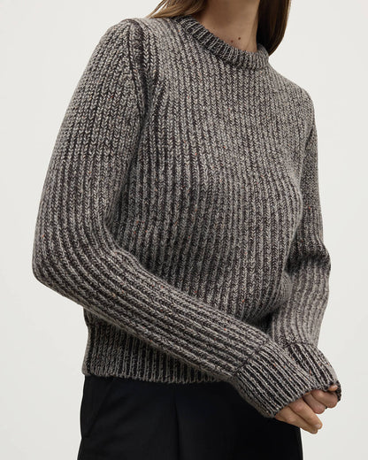 Model wearing Johnstons of Elgin AW25 Women's Knitwear Peregrine Donegal & Molasses High Neck Donegal Cashmere Brown Jumper Close Up KAC05590Q25393