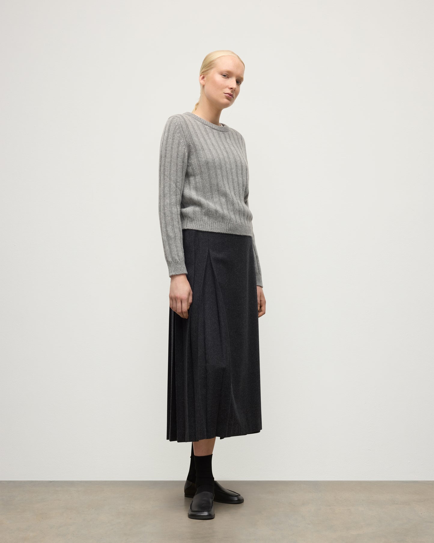 JOHNSTONS OF ELGIN WOMENS LECHT CREW SWEATER GREY 100% CASHMERE ON A MODEL WORN WITH A LONG LE KILT CHARCOAL KILT KAC05706HA0400