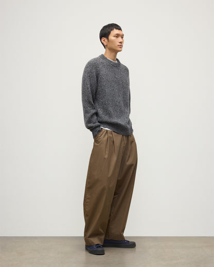 MALE MODEL WEARS JOHNSTONS OF ELGIN FYFE CREW SWEATER NAVY 100% CASHMERE OVER WHITE T-SHIRT AND BROWN TROUSERS  KAC05753006876