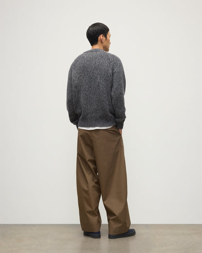 MALE MODEL WEARS JOHNSTONS OF ELGIN FYFE CREW SWEATER NAVY 100% CASHMERE OVER WHITE T-SHIRT AND BROWN TROUSERS  KAC05753006876