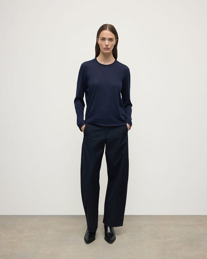 Model wears Johnstons of Elgin AW25 Women's Knitwear Navy Superfine Cashmere Jumper  KAI05318SD7600