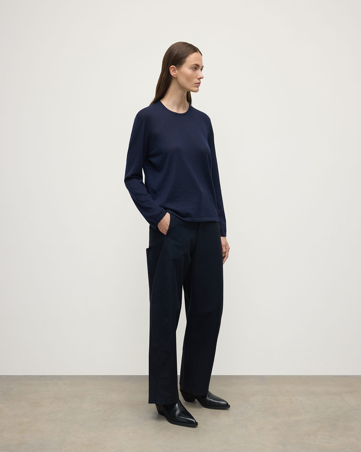 Model wears Johnstons of Elgin AW25 Women's Knitwear Navy Superfine Cashmere Jumper  KAI05318SD7600