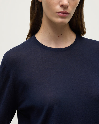 Model wears Johnstons of Elgin AW25 Women's Knitwear Navy Superfine Cashmere Jumper  KAI05318SD7600