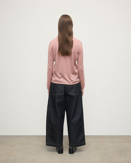 Model wearing Johnstons of Elgin AW25 Women's Knitwear Nude Superfine Cashmere Pink Jumper Back View KAI05318SE5274
