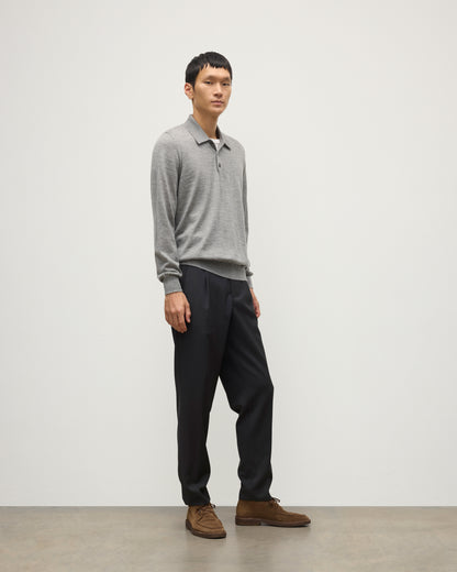 MODEL WEARING JOHNSTONS OF ELGIN MENS FIN SUPERFINE LONG SLEEVE POLOSHIRT GREY 100% SUPERFINE CASHMERE WITH BLACK TROUSERS KAI05481HA4253