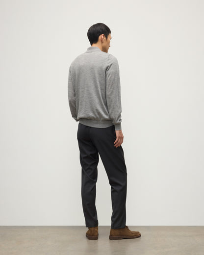 MODEL WEARING JOHNSTONS OF ELGIN MENS FIN SUPERFINE LONG SLEEVE POLOSHIRT GREY 100% SUPERFINE CASHMERE WITH BLACK TROUSERS KAI05481HA4253