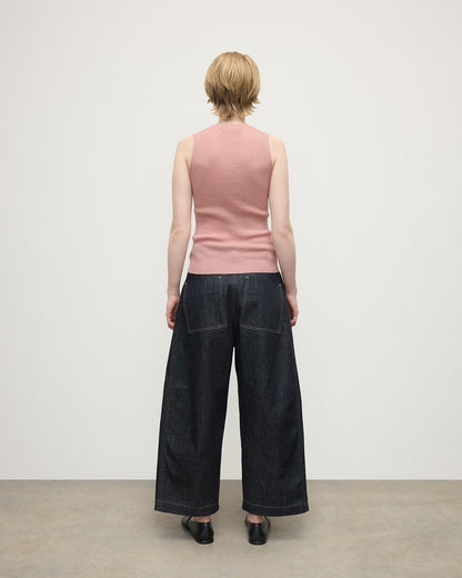 model wears Johnstons of Elgin AW25 Women's Knitwear Nude Sleeveless Pink Tank Top Back View KAI05559SE5274