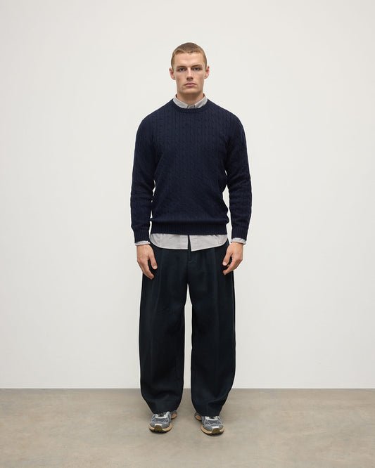 Model is wearing Johnstons of Elgin AW25 Men's Knitwear Dark Navy Cable Knit Navy Cashmere Jumper Front KAI05693SD7666