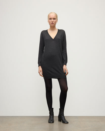 MODEL WEARING JOHNSTONS OF ELGIN WOMENS ELISE VEE SWEATER GREY 100% SUPERFINE CASHMERE WITH BLACK TIGHTS AND BOOTS KAI05715HA7218