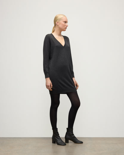 MODEL WEARING JOHNSTONS OF ELGIN WOMENS ELISE VEE SWEATER GREY 100% SUPERFINE CASHMERE WITH BLACK TIGHTS AND BOOTS KAI05715HA7218